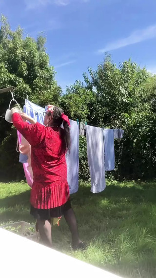 Dressed with a vintage dress to hang laundry outside