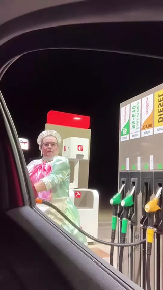 In a green and pink maid outfit to go and fill up the car thumbnail