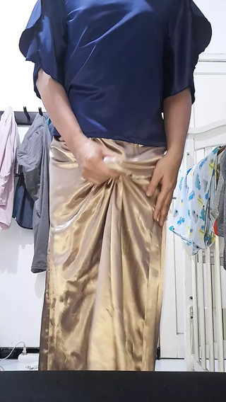 Cum wearing long satin skirt and blouse