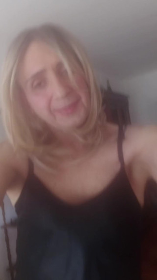 Vany sitting on the sofa in a room thumbnail