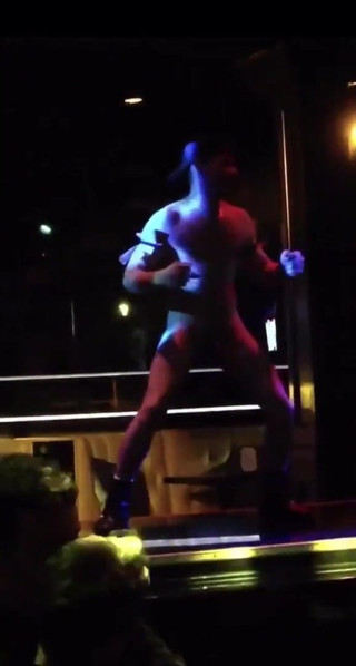 Stripper with a huge cock is dancing