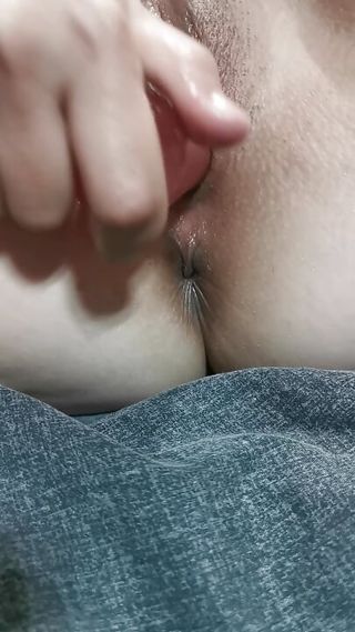 Trying to be quiet Stuffing my pussy with dildo while husband sleeps