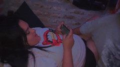 Girl Playing Video Games While Boyfriend Touches Her