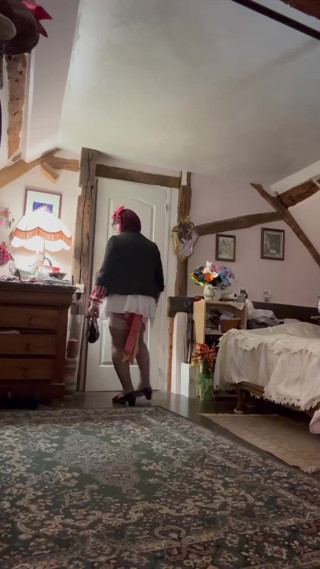 In an outfit with a short, slit skirt for an evening thumbnail