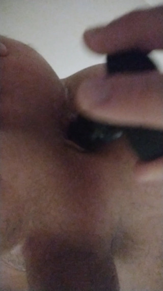 Using the new toy in my tight ass