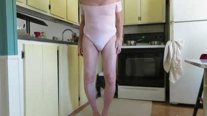 Male slut in a leotard shows his fem ass cheeks.