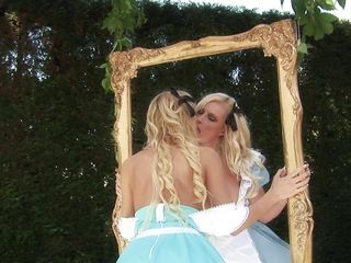 Two Blonde Look-alikes Fuck Each Other Outdoors with Their Massive Dildos