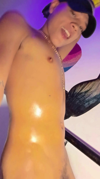 Latin American Bathing In Oil And Dances Sexy While His Cock Gets Hard thumbnail