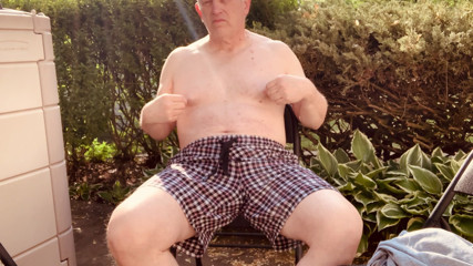 Outside in my yard, naked and masturbating