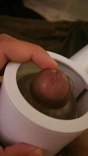 Solo boy playing masturbate machine in bedroom.