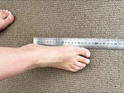 TinySizedFeet Measuring against ruler and home items 