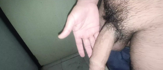 I love being naked in the staff restroom. I love caressing my penis.