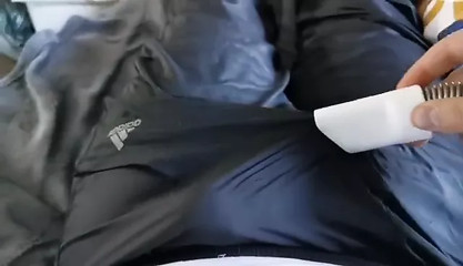 Vacuuming dusting my cock through adidas nylon pants