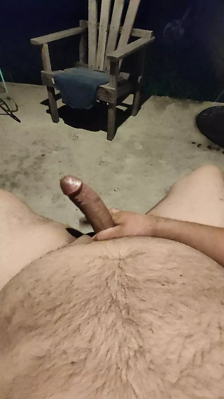 Stroking my hard cock on my patio. Huge cumshot.