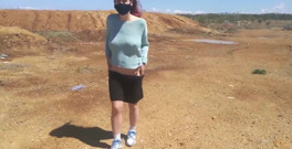Girl undresses on a windy day