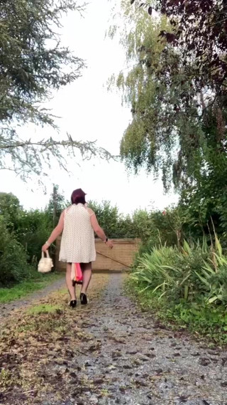 In an outfit with a polka dot dress for an evening. thumbnail
