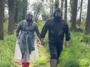 Plastic raincoat and gasmask in the woods