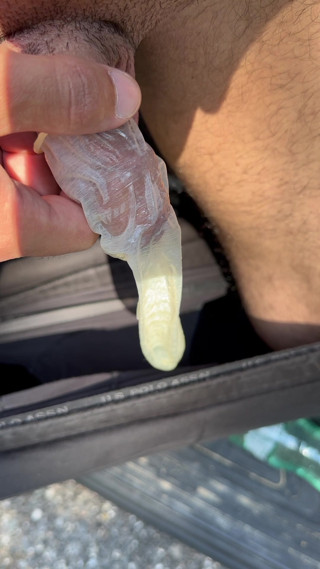 Pissing in a condom on the highway