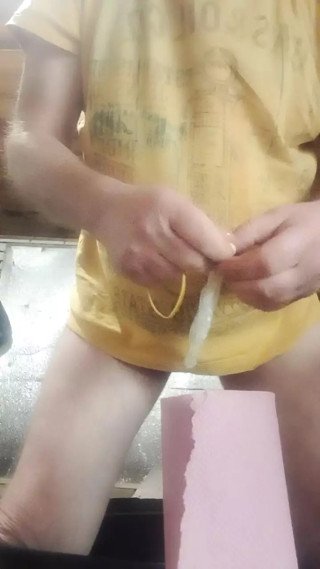 Fucking a kitchen towel with a condom
