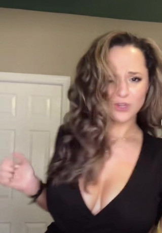 The Busty Educator dancing her cleavage