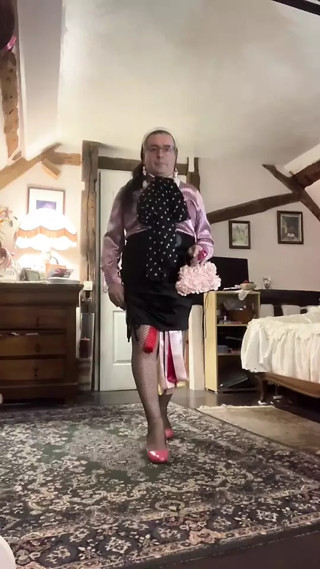 Outfit with a black skirt and a pink striped blouse