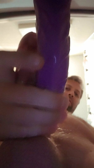 Dildo ride with cumshot