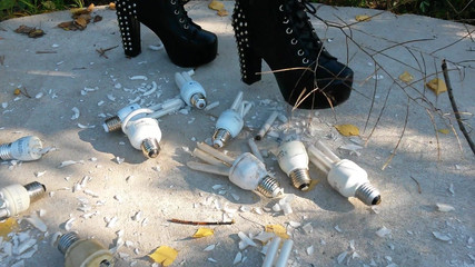 Lady y L crush crush with black boots light bulbs.