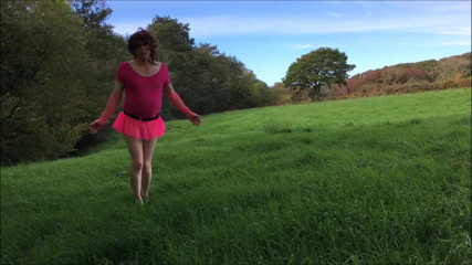 sissy kathy outside in his ballet dress