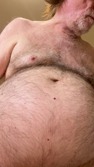 Coach Karl Rubs His Belly for You 6963