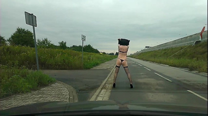 Strip on public street - only bra, stockings and heels left
