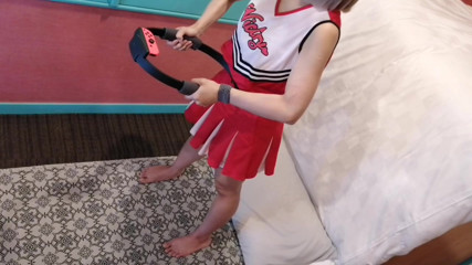 A cute, busty married woman does exercise 3 in a sexy cheerleader costume. Peeking down from above. Home made amateur Private Shoot