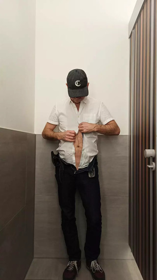 Naked in public toilette