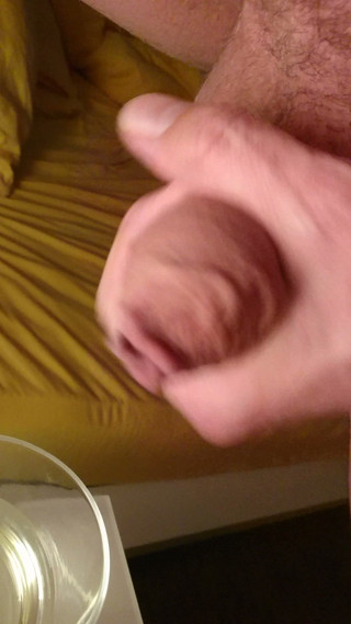 Cumming into a glass of pee
