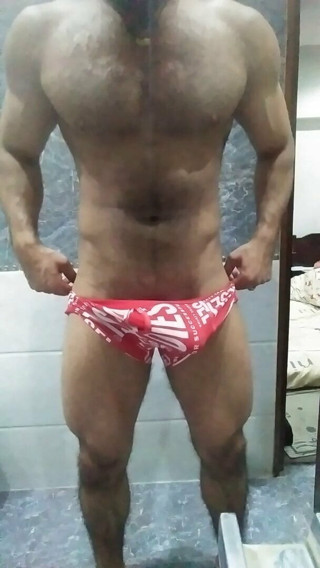Big hunk stripping and showing his meat