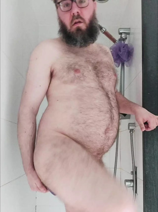 Chastity locked bear with dildo