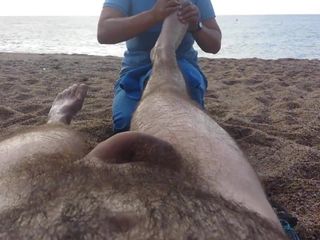 Nude massage on the beach