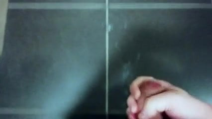 Big cock - big cumshot on bathroom floor