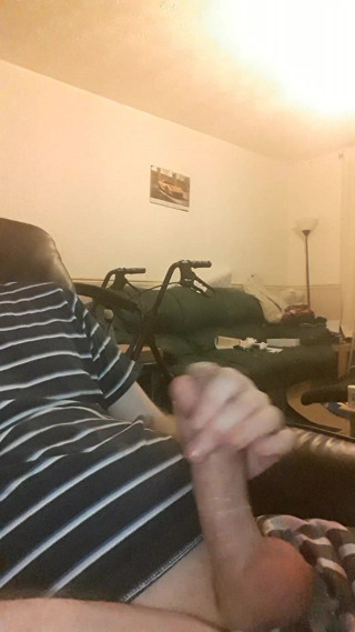 Trying to put a condom over my cock