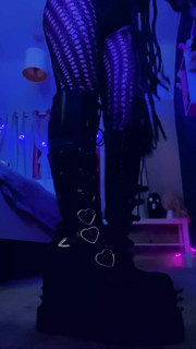 Mistress Walking in Leather Boots
