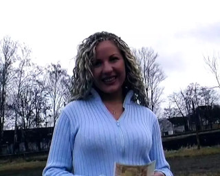 Busty German MILF plays with a dildo before making a guy cum