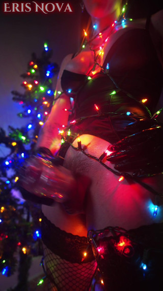 Eris Nova Jerks off Wrapped in Christmas Lights thumbnail