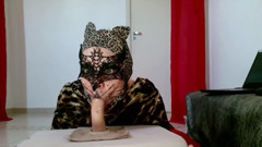 Hungry CatWoman shows how to use tounge on dick