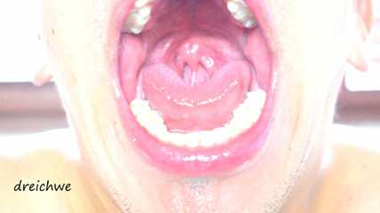 Delicious wide open mouth with lots of saliva