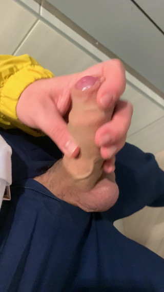 Handjob in public toilet