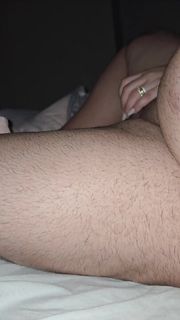 Step mom handjob step son dick while sitting naked in bed and waching on tv