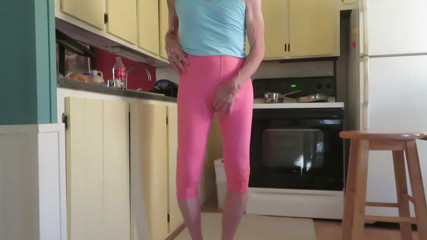 Crossdresser in tight woman's leggings.