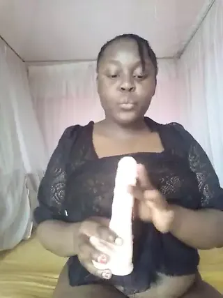 Clothed ebony masturbating