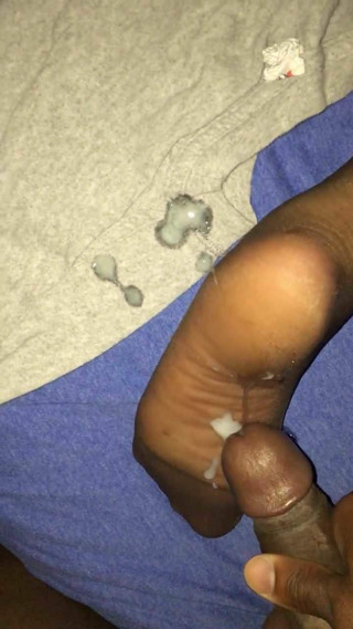 Cumshot on wife's nylon soles