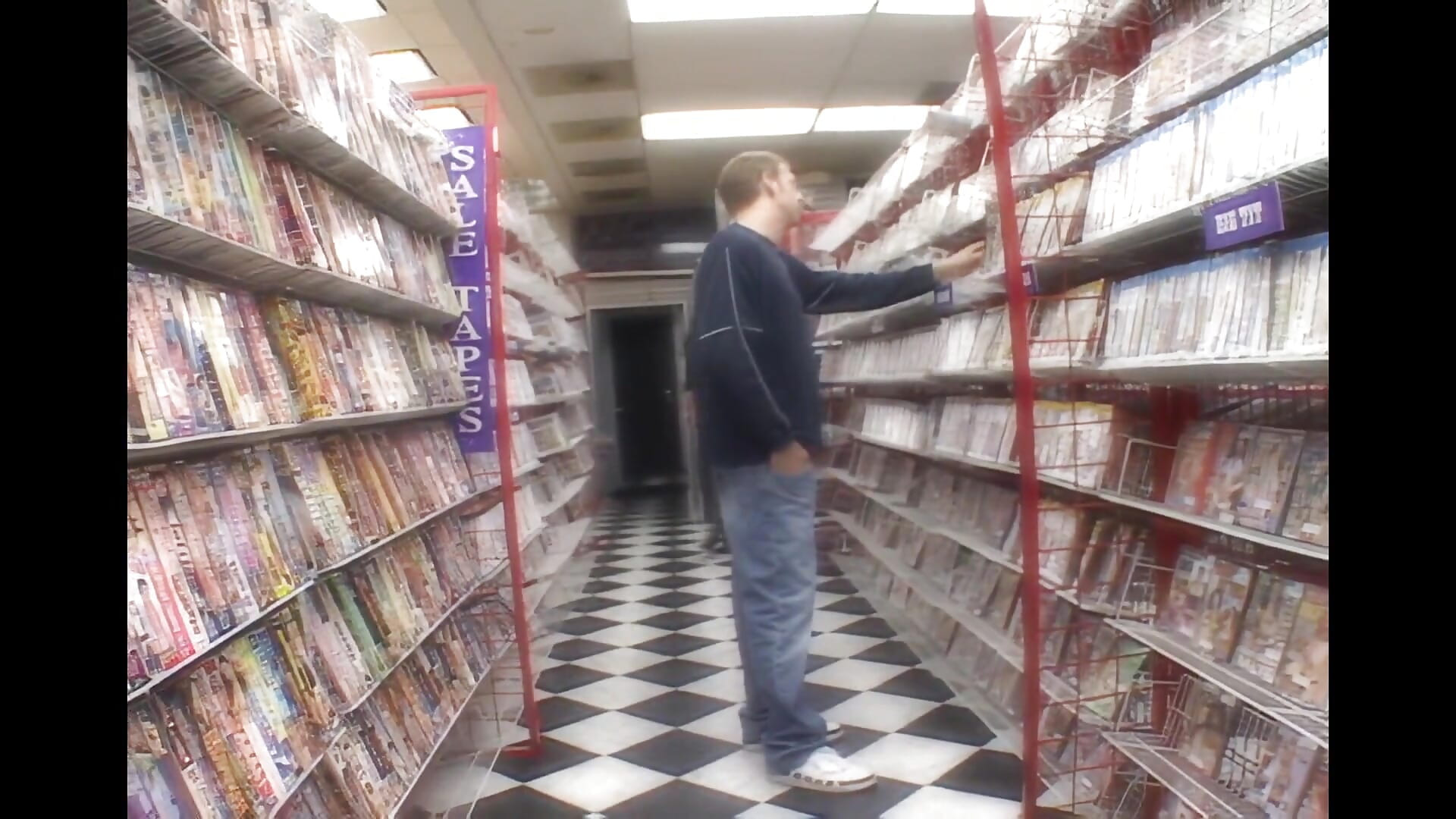 Lindsay Kay in a Hot Threesome in the Video Store