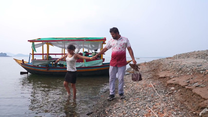 Couple Enjoy in River and Mountain